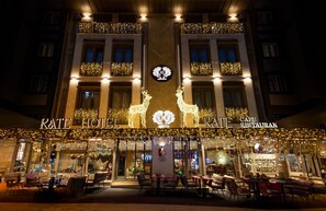 A hotel with a prominent sign reading "KATE HOTEL" and "CAFE RESTAURANT" below. - Kate Hotel Special Class & Spa (Istanbul)