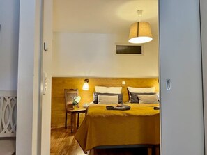 1 bedroom, desk, iron/ironing board, travel cot