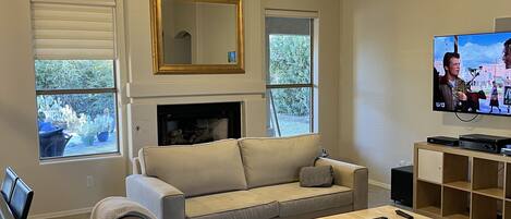 Smart TV, fireplace, DVD player, books
