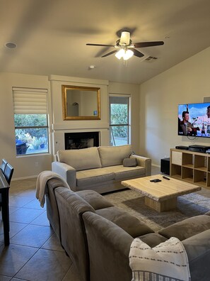 Smart TV, fireplace, DVD player, books