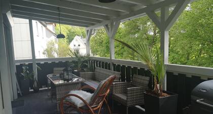 Up-to-date at top prices! Accommodation with large covered terrace on the edge of the forest