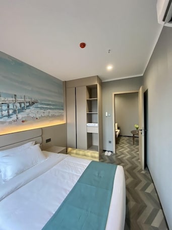 Family Room, Multiple Beds, City View | In-room safe, desk, soundproofing, free WiFi