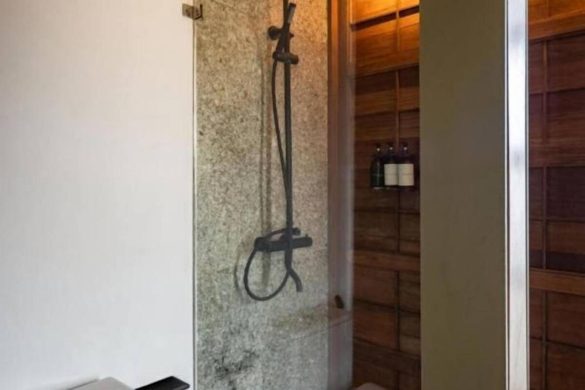 Bathroom | Separate bathtub and shower, rainfall showerhead, hair dryer, bathrobes
