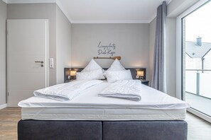3 slaapkamers, een strijkplank/strijkijzer, reisbedje, wifi