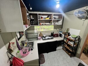 Full-sized fridge, stovetop, toaster, rice cooker