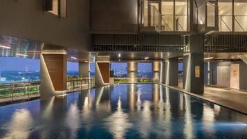 Outdoor pool, pool umbrellas, sun loungers