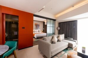 Premier Apartment, 1 Queen Bed | Living area | 43-inch Smart TV with premium channels, TV