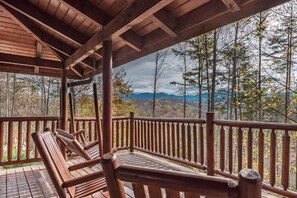 A wooden deck with a view of a forest and mountains. - Grace Manor, Private Pool, FREE Attraction tickets for each paid day, Hot Tub!!! (Sevierville)