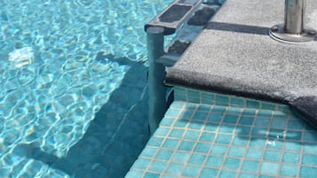 Seasonal outdoor pool, pool umbrellas, sun loungers