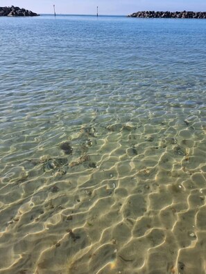 Platja privada i tovalloles de platja 