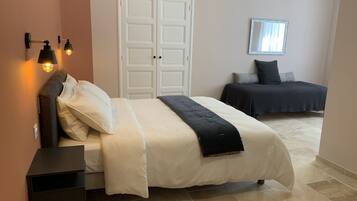 Deluxe Triple Room | Premium bedding, memory-foam beds, in-room safe, desk