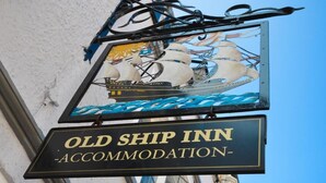 A sign for the Old Ship Inn Accommodation with a nautical theme. - Old Ship Inn (Dorchester)