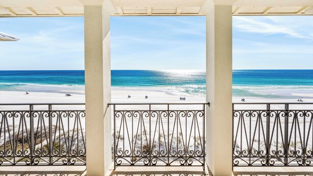 A balcony with a view of a beach and ocean. - The Brookie*OnBeach*BeachSvc*Elevator*2Pools (Miramar Beach)