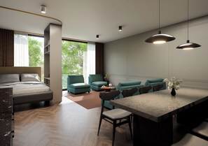 A modern hotel room with a bed, seating area, and a dining table. - Apartmenthaus Berlin Mitte (Berlin)
