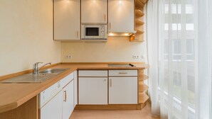 Suite – deluxe | Eget kjøkken | Espressomaskin, kaffetrakter/tekoker, kjøleskap og mikrobølgeovn
