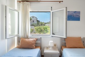 2 quartos, Wi-Fi de cortesia, roupa de cama