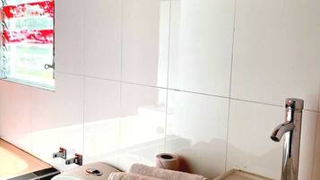 Premium Double Room | Bathroom | Shower, hair dryer, towels, soap