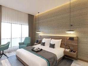 Een minibar, een kluis op de kamer, een bureau, een laptopwerkplek