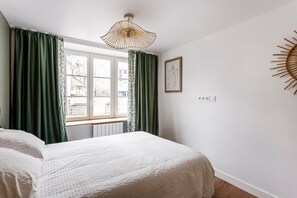 2 slaapkamers, een strijkplank/strijkijzer, gratis wifi, beddengoed
