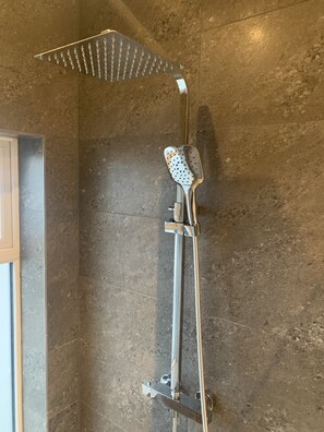 Shower, hair dryer, towels, soap