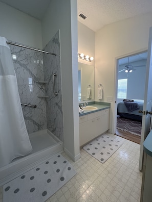 Shower, hair dryer, towels, soap - Peyton's Patio Homes in The Villages, Florida (Lady Lake)