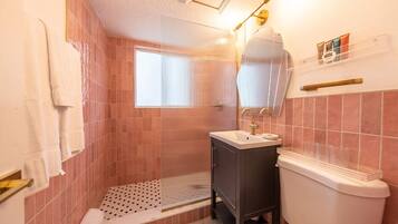 Shower, hair dryer, towels, soap