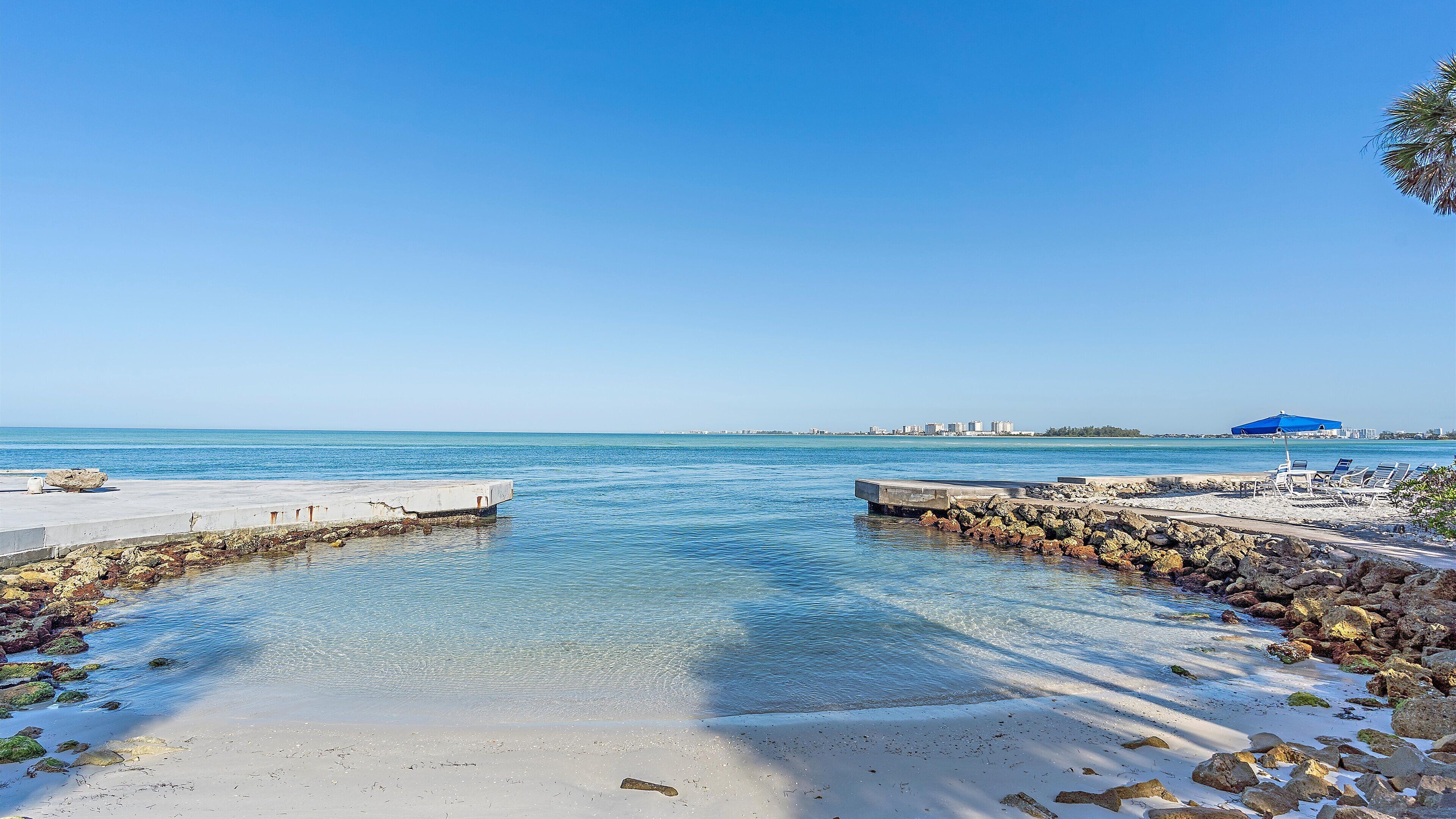 On the beach, sun-loungers