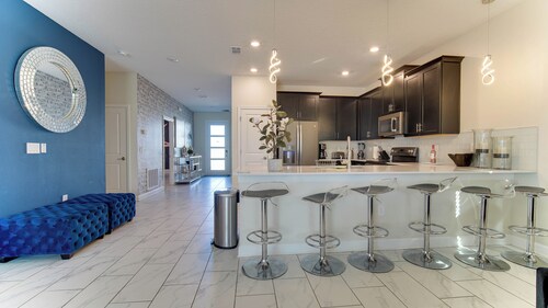 20 LARGE FAMILY AT CHAMPIONSGATE POOL 