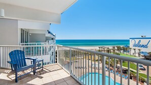 A balcony with a view of the beach and pool area. - 🌊 Gulf Front~Pools~Walk 2 Beach~Beach SVC~2BR Destin West Gulfside 608 (Fort Walton Beach)