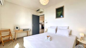 1 chambre, fer et planche Ă repasser, Wi-Fi gratuit, draps fournis