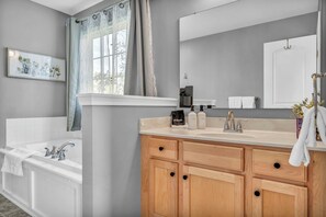 Shower, jetted tub, hair dryer, towels