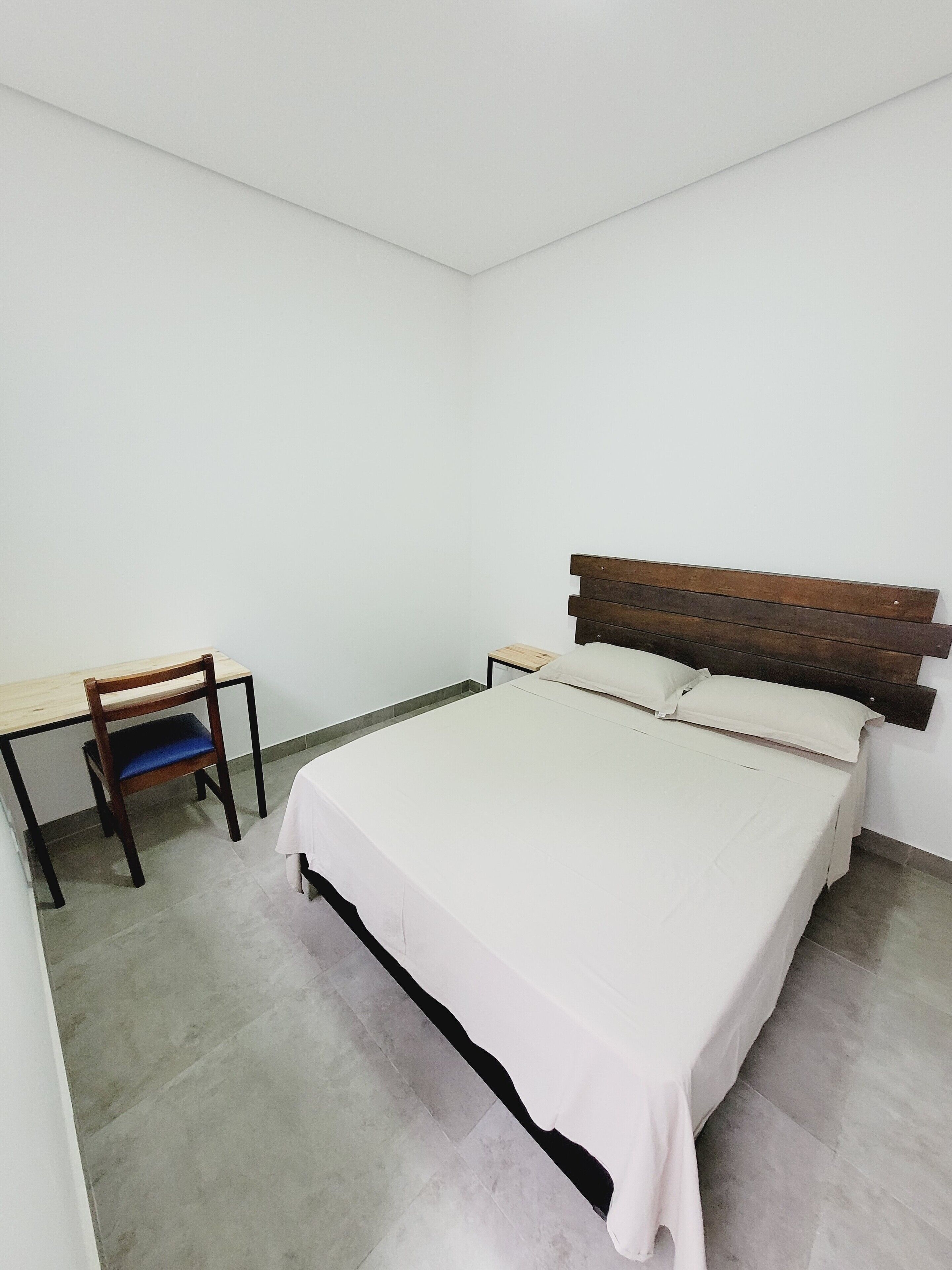 Desk, laptop workspace, free WiFi, bed sheets