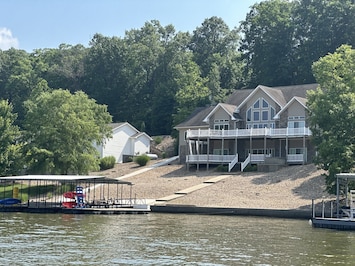 Dock, water toys, boat slip, fire pit, checks all the boxes for fun family vacation.