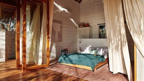 A bedroom with a wooden floor, a bed with a green blanket, a wooden-framed window, and a ceiling fan. - Pacific SurfShack Ocean View Mal Pais/Santa Teresa (Santa teresa)