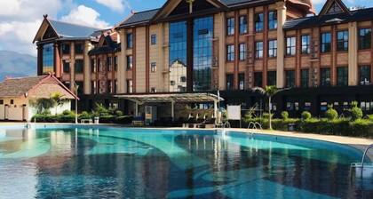 Menluo Wa Jing Luxury Grand Hotel(Hulu Town Wa Tribe Branch)