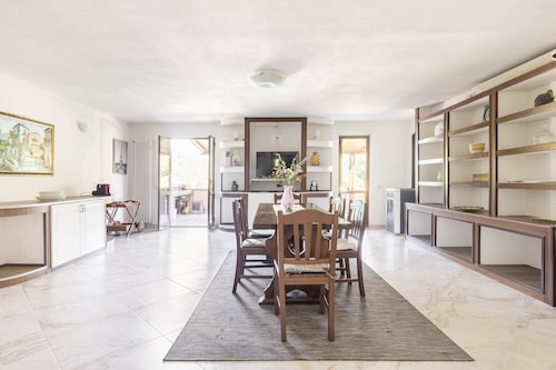 Apartment with private garden and pool