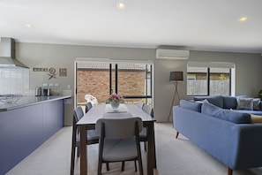 Apartment | Living area | 55-inch TV with digital channels, Netflix, streaming services