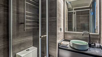 Shower, hair dryer, towels, soap