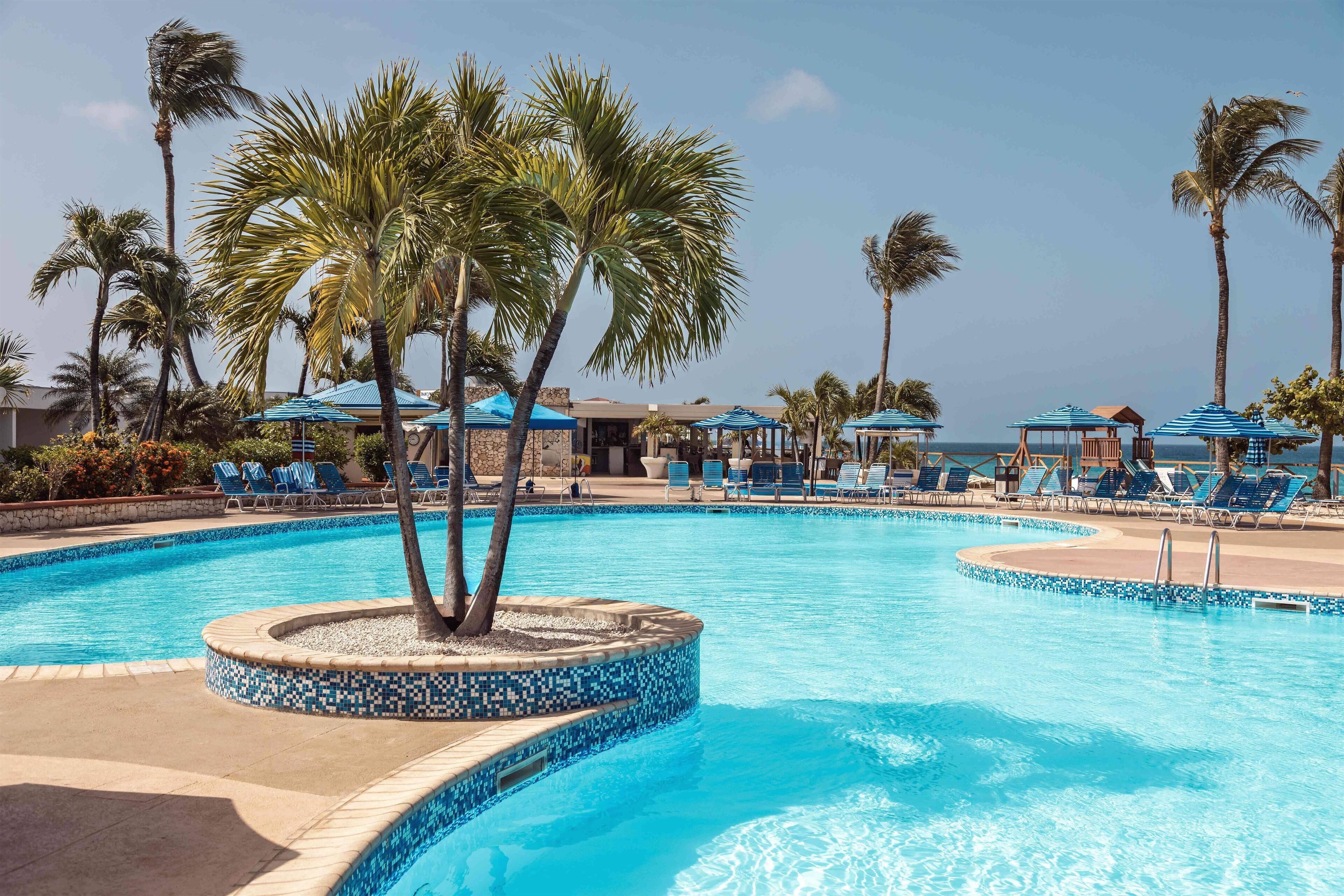 Outdoor pool, pool umbrellas, pool loungers