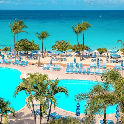 Outdoor pool, pool umbrellas, sun loungers