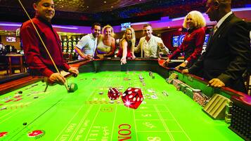Experience the excitement of our casino gaming area, where you can play blackjack and roulette.