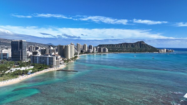 On the beach, sun loungers, beach towels