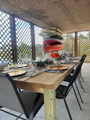 Outdoor dining - Waterfront Retreat w/ Hot Tub, Game Room, Kayaks, 2 Kings, + more! (White Stone)