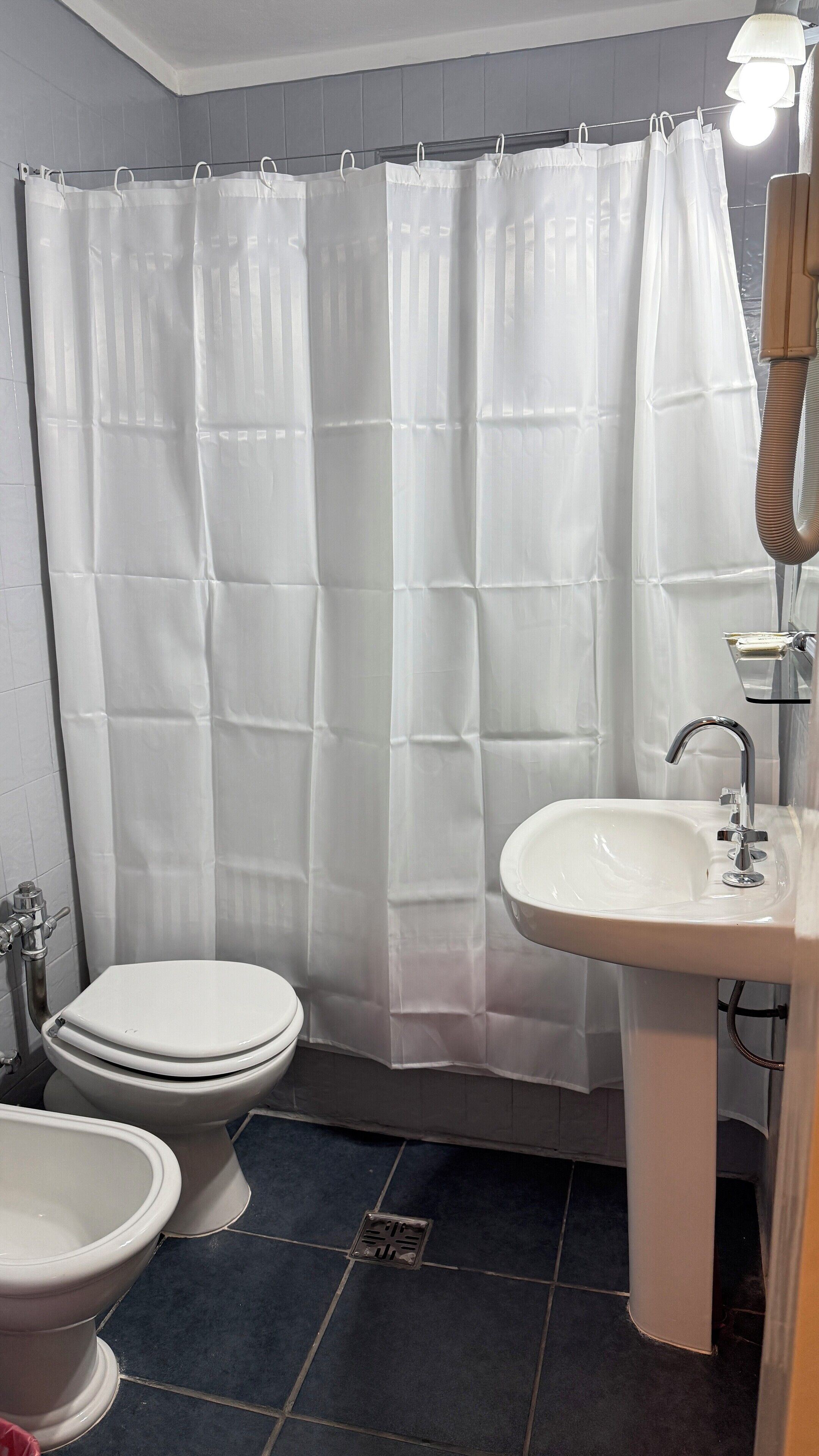 Hair dryer, towels, soap, toilet paper