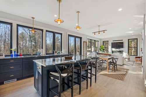 Beautifully built Cape Elizabeth home nestled in the woods on 2.5 acres