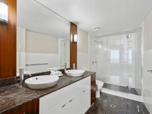 Shower, hair dryer, towels