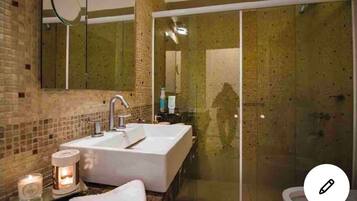 Hair dryer, bidet, towels, toilet paper