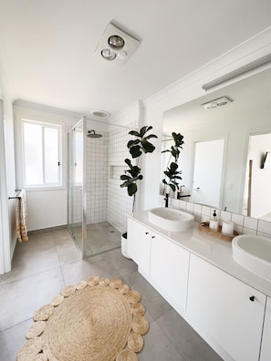 Shower, hair dryer, towels, soap