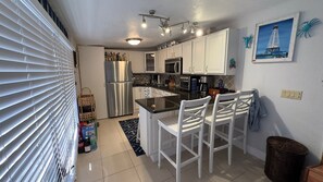 Fridge, microwave, coffee/tea maker, toaster