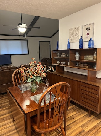 Dining. Cottage in the woods. In a safe gated community near Lake Catherine.